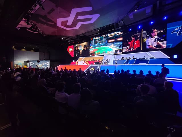 Packed arena watching a live gaming event under the Esports Foundry logo