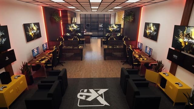 Finished gaming lounge with branded wall art, gaming stations, and lounge seating